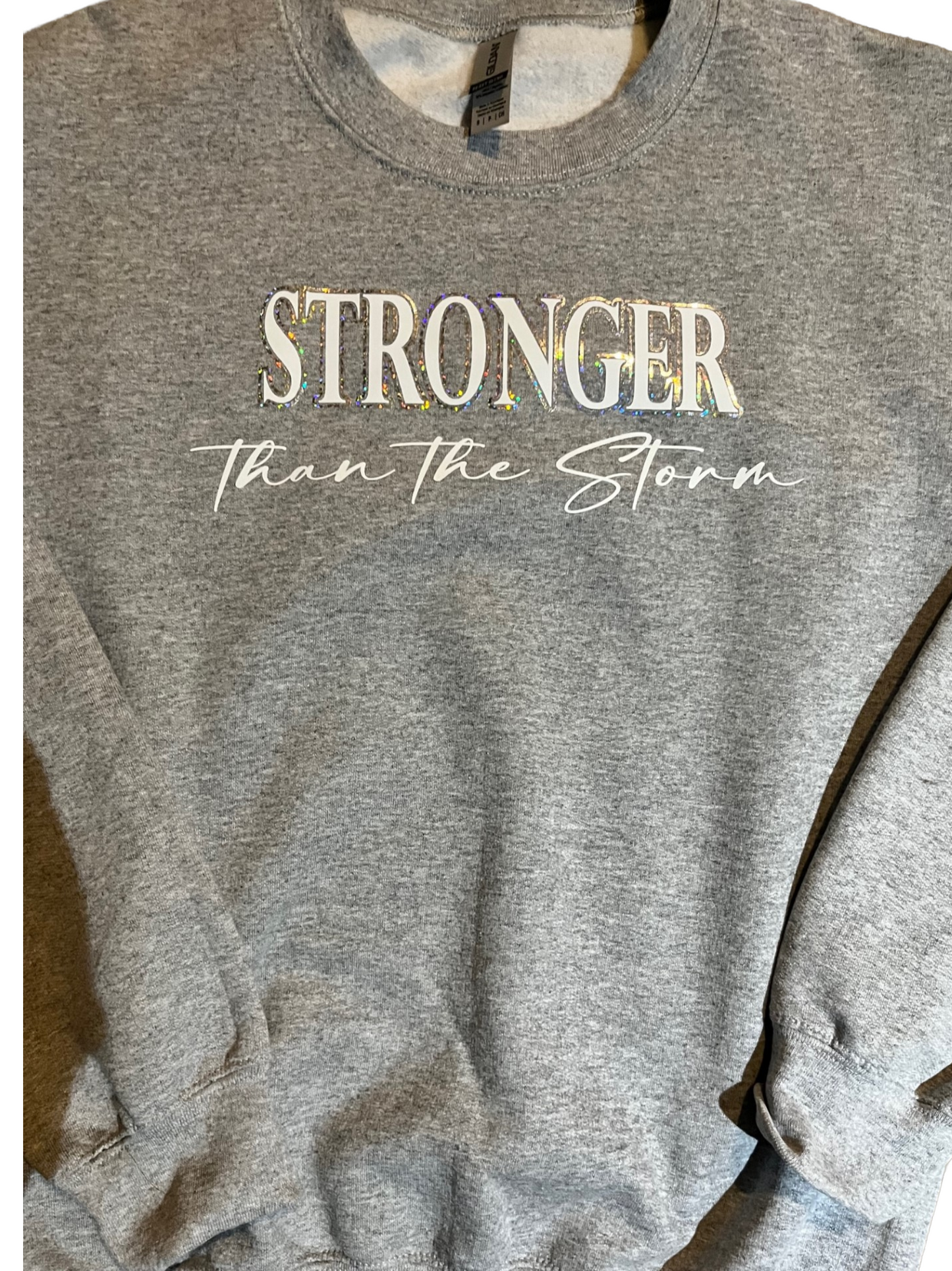 Stronger than the storm Crewneck