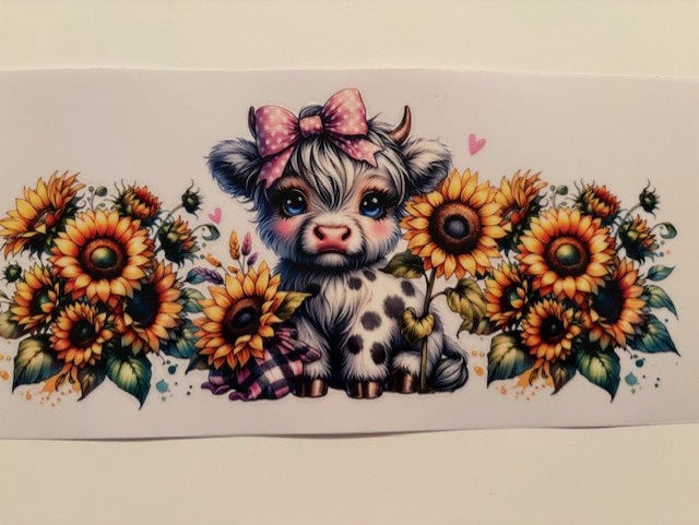 Cow with suflowers