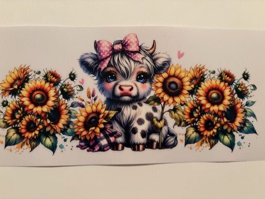 Cow with suflowers